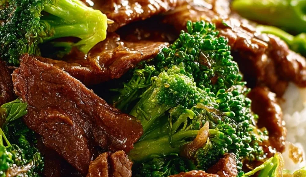 A vibrant plate of Chinese Beef and Broccoli, showcasing tender beef and fresh broccoli.