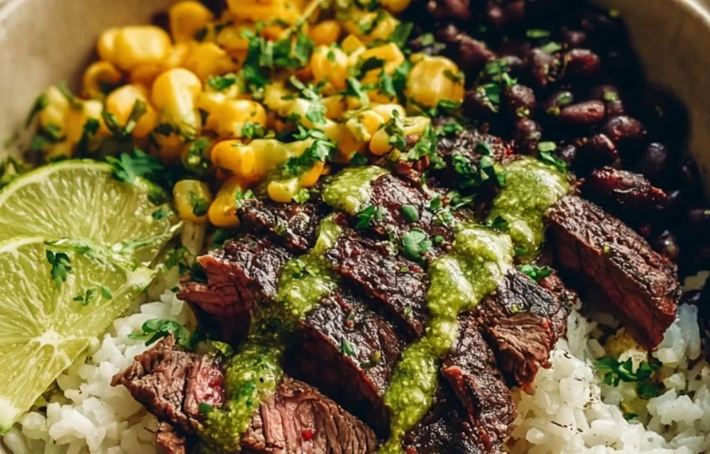 Cilantro Lime Steak Bowl topped with fresh vegetables and lime