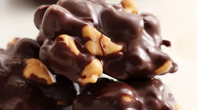 Delicious homemade chocolate peanut clusters on a cooling rack