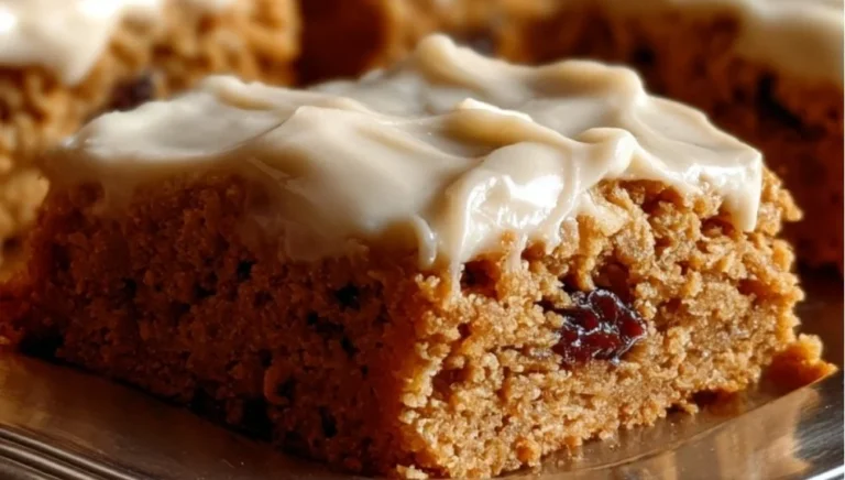 Delicious easy oatmeal raisin cookie bars on a wooden table
